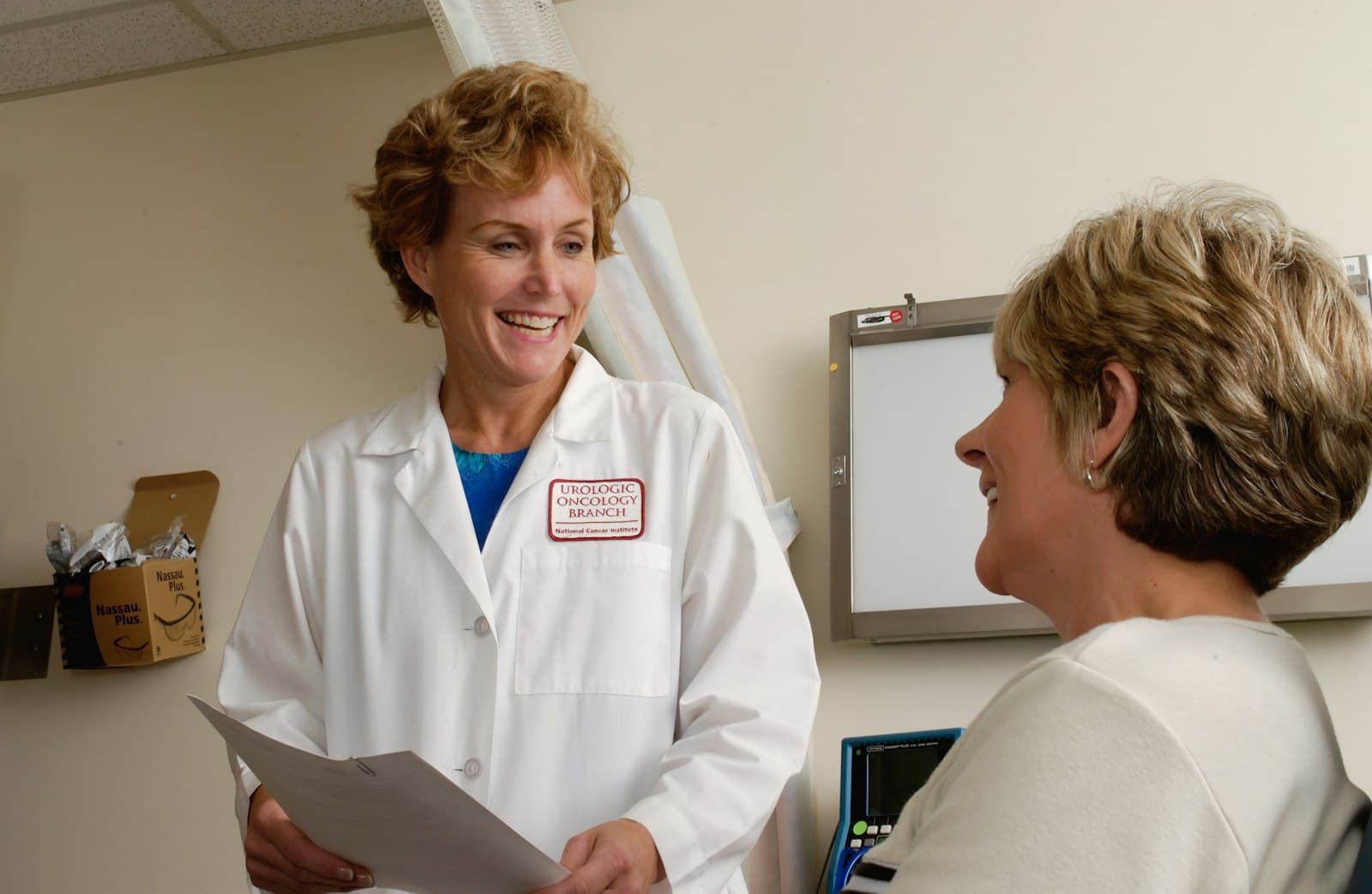Veterinarian reviewing care options with a pet owner